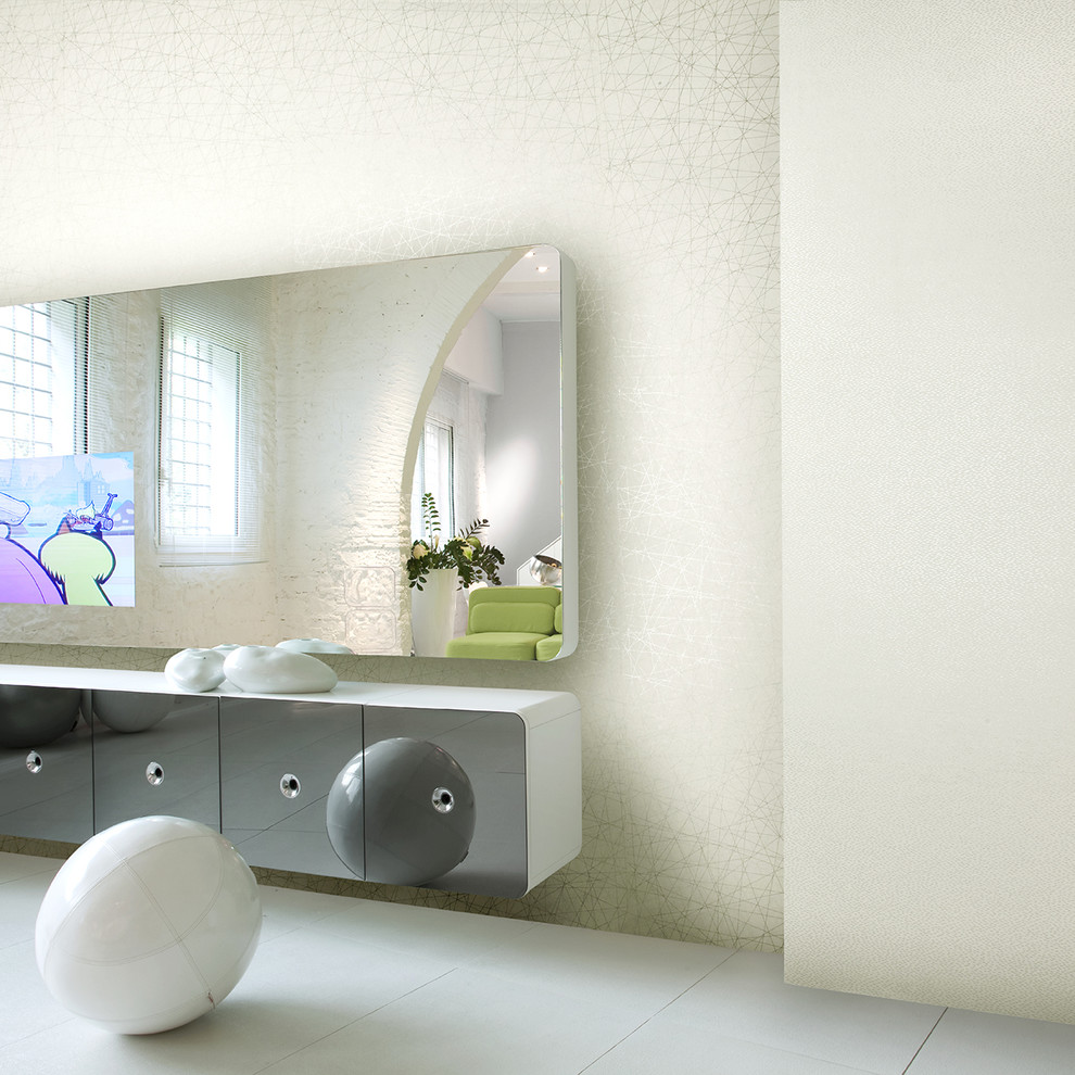 Стильный дизайн: открытая гостиная комната среднего размера в стиле модернизм с бежевыми стенами, полом из керамогранита и телевизором на стене без камина - последний тренд
