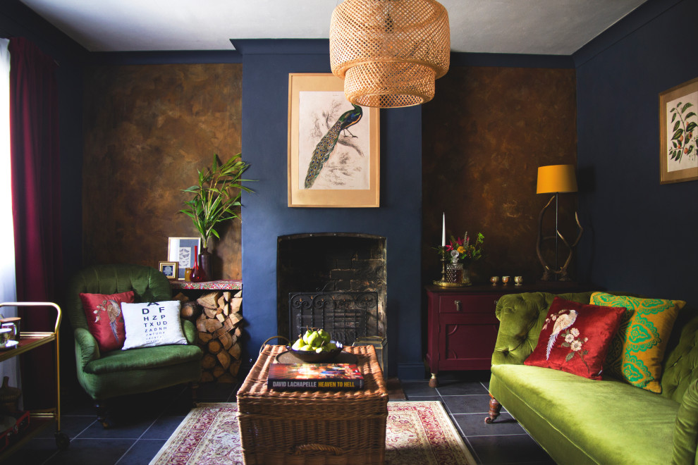 Inspiration for a mid-sized transitional enclosed ceramic tile and blue floor family room library remodel in Oxfordshire with blue walls, a standard fireplace, a plaster fireplace and no tv