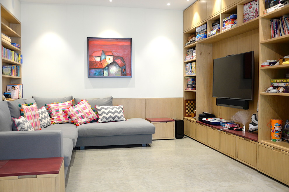 Immagine di un soggiorno moderno di medie dimensioni e chiuso con pareti bianche, pavimento in cemento, pavimento grigio e parete attrezzata