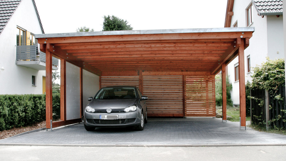 Свежая идея для дизайна: гараж в современном стиле - отличное фото интерьера