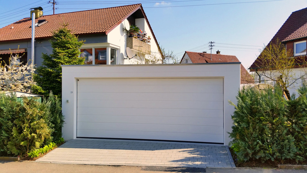 Example of a huge trendy garage design in Stuttgart