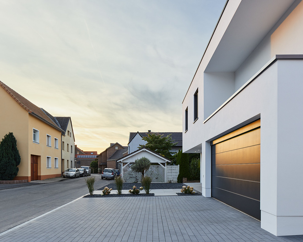 Inspiration for a medium sized contemporary attached garage in Dusseldorf.