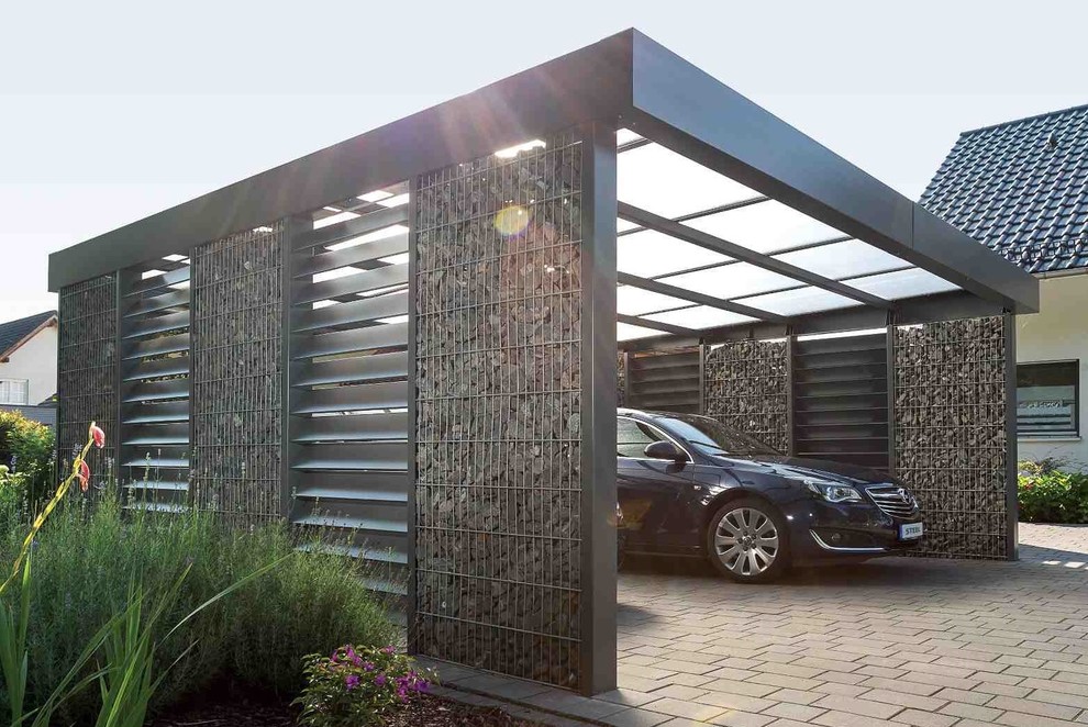 Example of a large trendy detached two-car carport design in Hanover