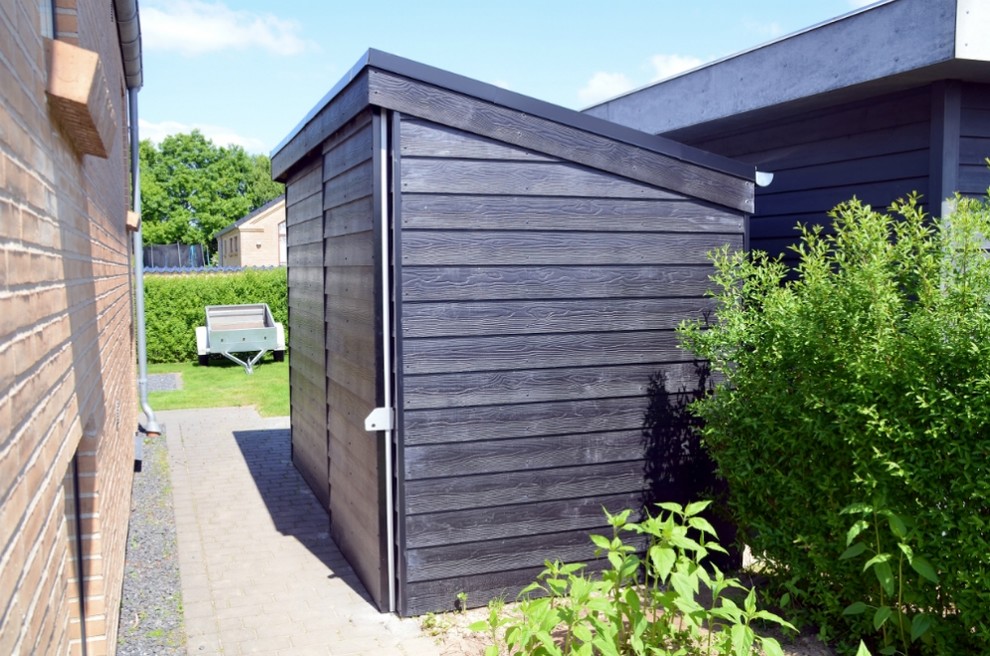 エスビャールにある北欧スタイルのおしゃれな物置小屋・庭小屋の写真