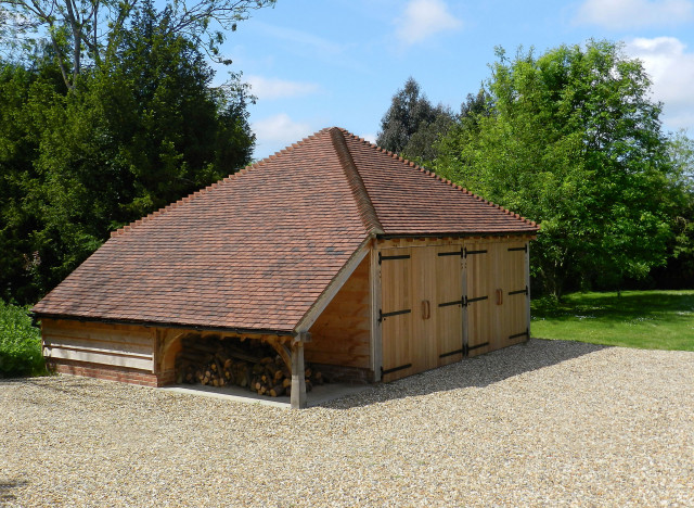2 Bay Oak Framed Garage with Catslide Log Store - Farmhouse - Garage -  Berkshire - by The Classic Barn Company | Houzz
