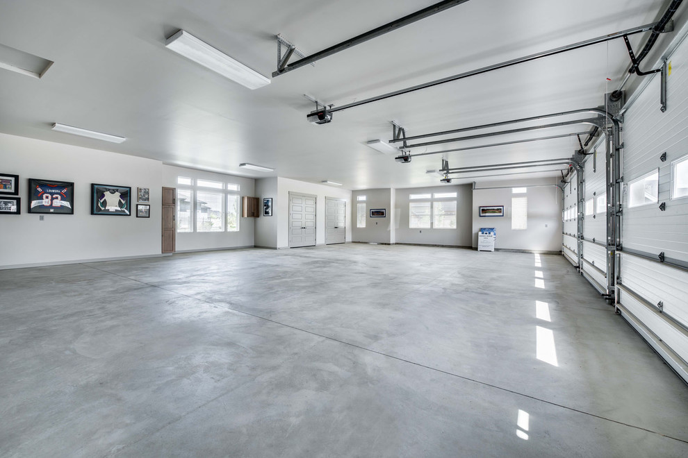 This is an example of an expansive classic attached garage in Boise with four or more cars.