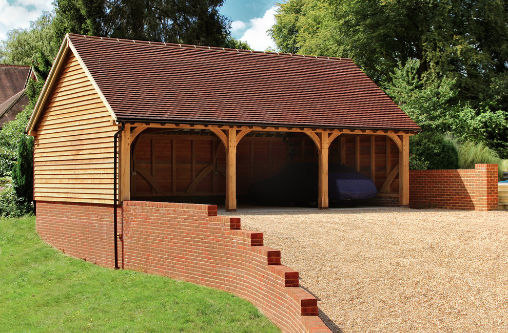 Medium sized rural detached carport in Hampshire with three or more cars.
