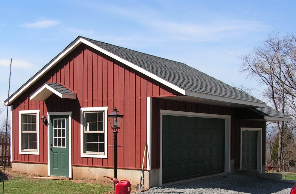 Diseño de garaje independiente de estilo de casa de campo grande para tres coches