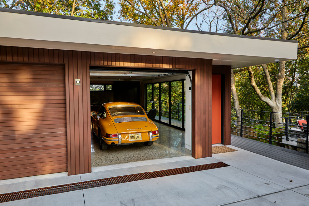 Пример оригинального дизайна: отдельно стоящий гараж среднего размера в стиле ретро с мастерской для двух машин