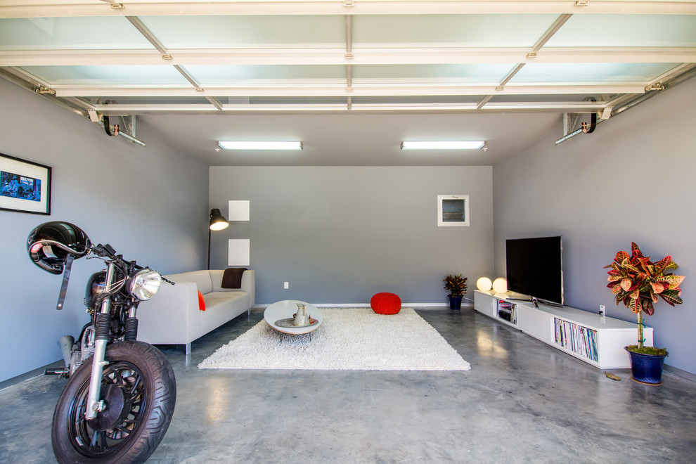 Example of a trendy two-car garage design in Los Angeles