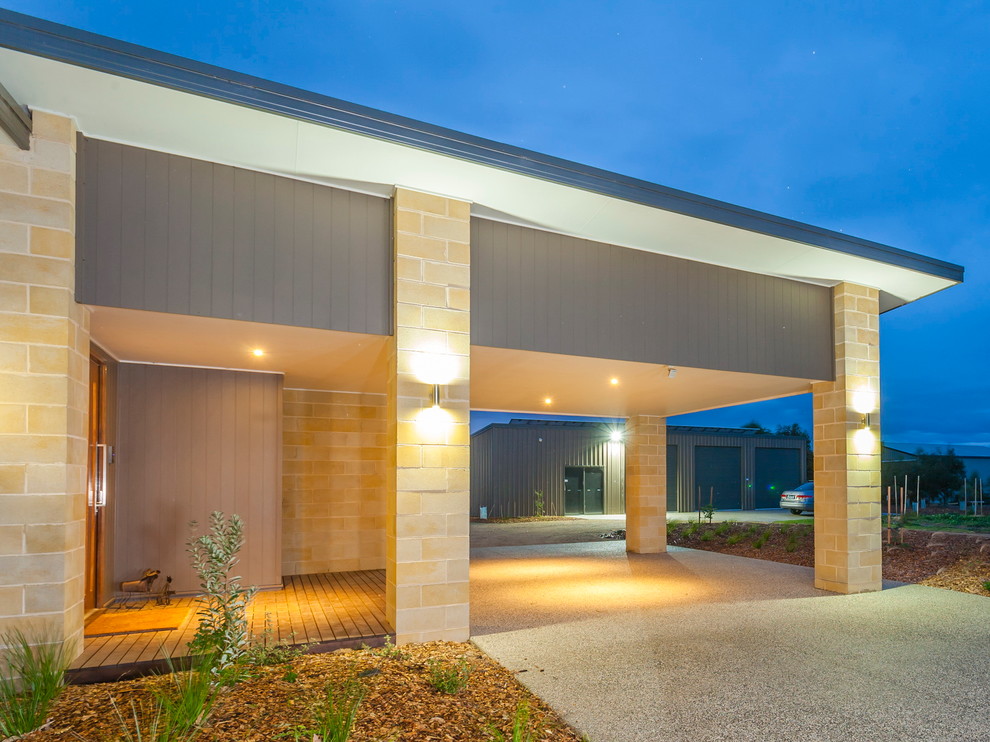 Inspiration for a contemporary attached single carport in Geelong.