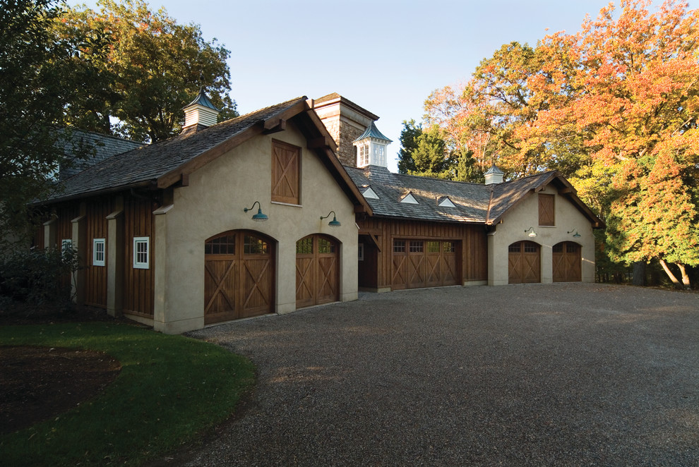 Example of a large attached four-car garage design in New York