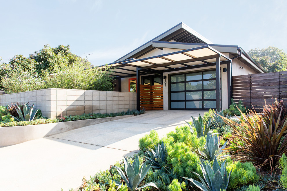 Inspiration for a mid-sized contemporary attached two-car porte cochere remodel in San Diego