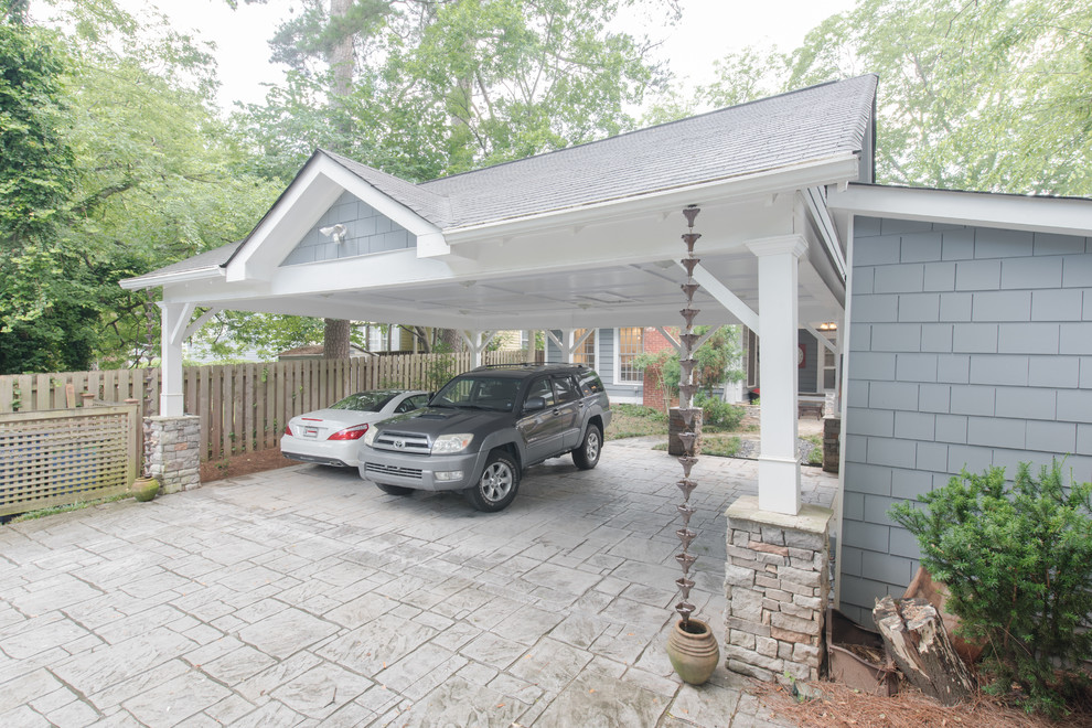 Photo of a classic detached carport in Atlanta with three or more cars.