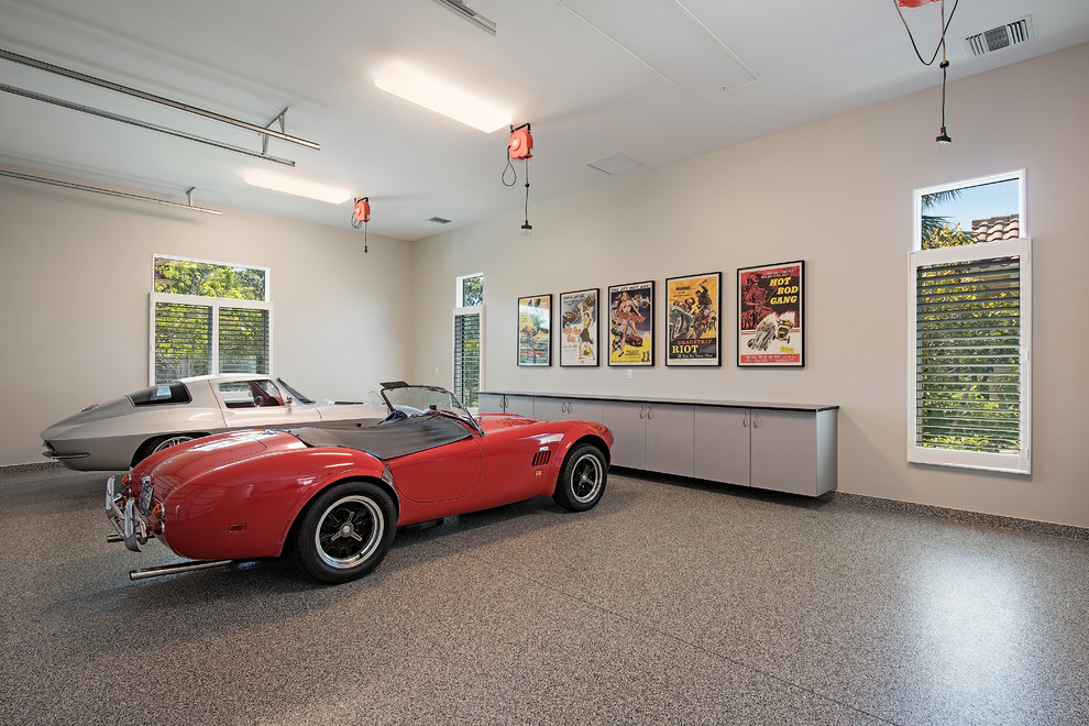 Contemporary garage in Miami with three or more cars.