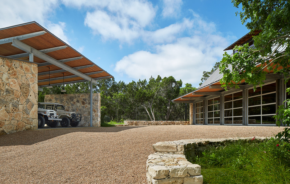 Expansive detached garage workshop in Austin with four or more cars.