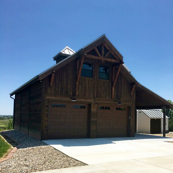 barn style garage with party loft - rustic - garage
