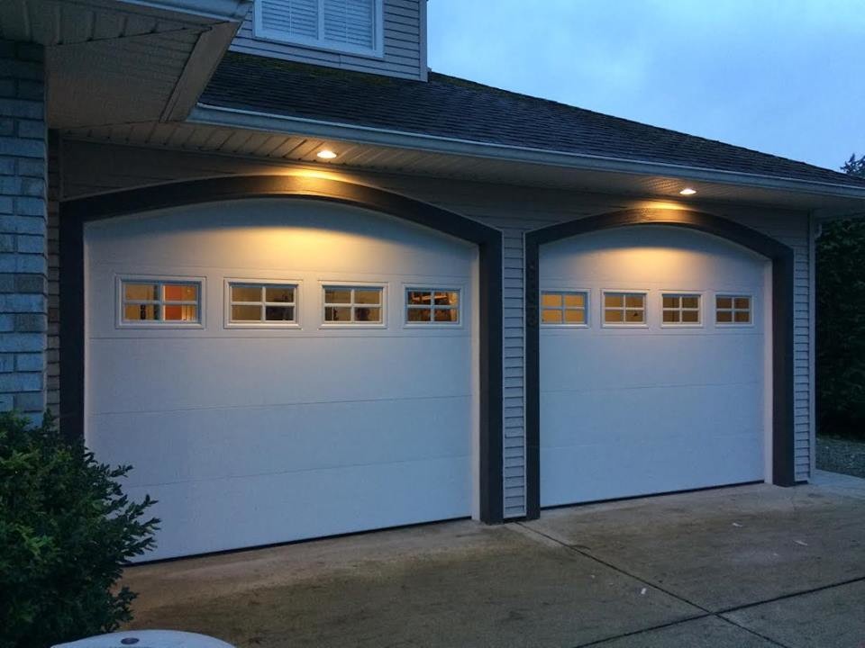 Mid-sized minimalist attached two-car carport photo in Vancouver