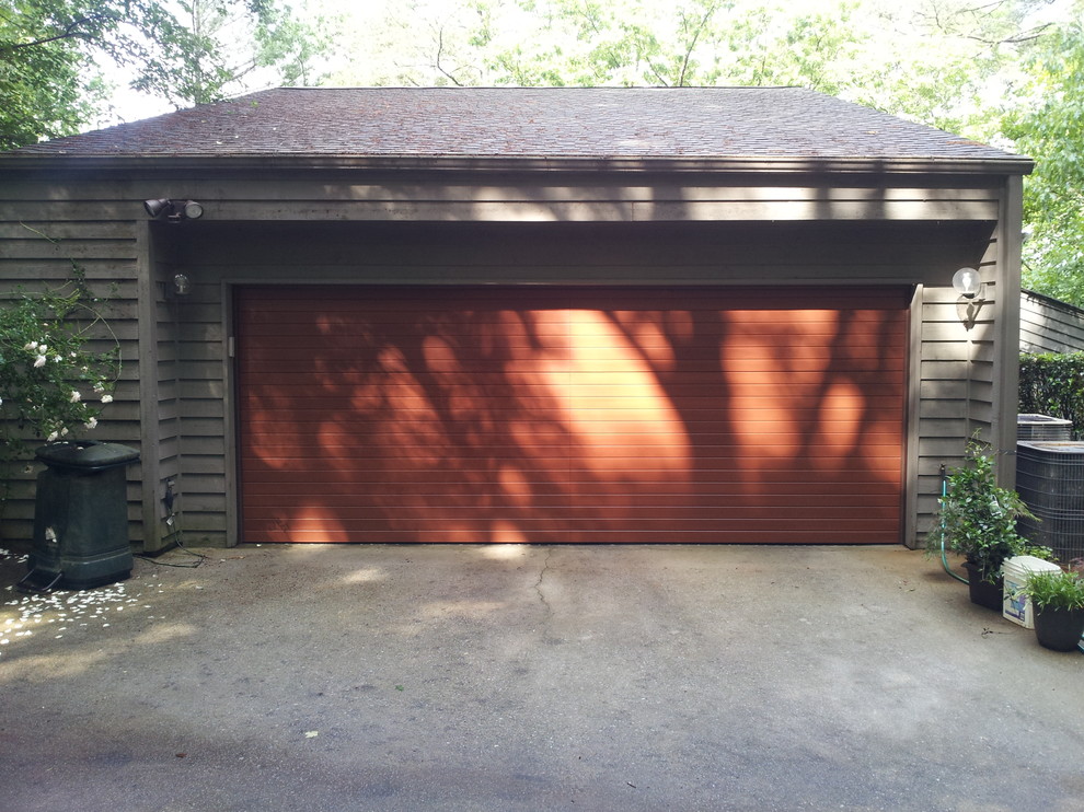 Inspiration for a contemporary detached double garage in Denver.