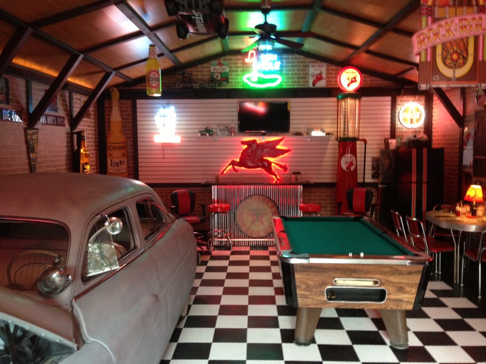 Mid-sized elegant detached three-car garage photo in Other