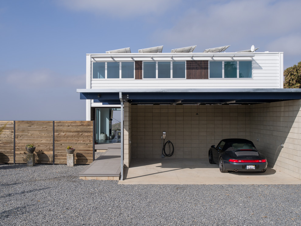 This is an example of a medium sized contemporary detached double carport in San Diego.