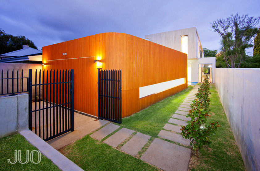 Inspiration for a huge modern detached three-car garage remodel in Perth