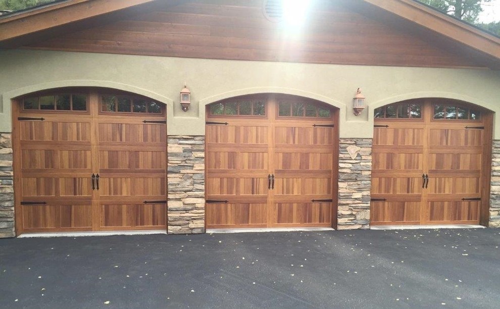 Inspiration for a large transitional attached two-car garage remodel in Cleveland