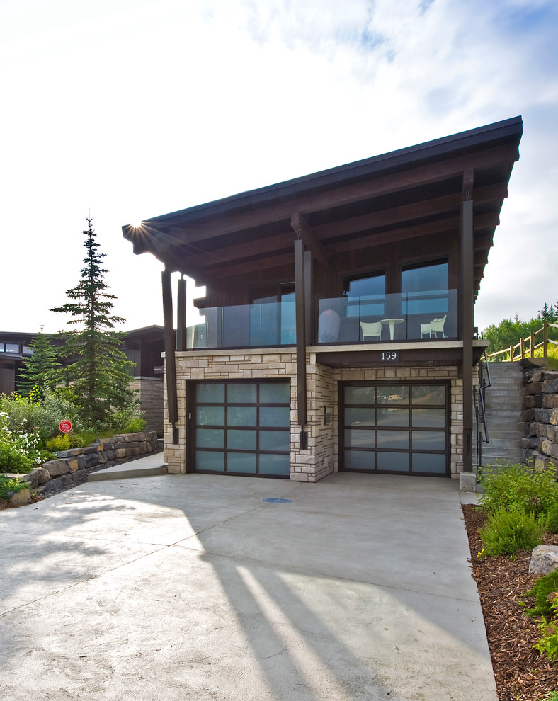 Réalisation d'un garage pour deux voitures attenant design.