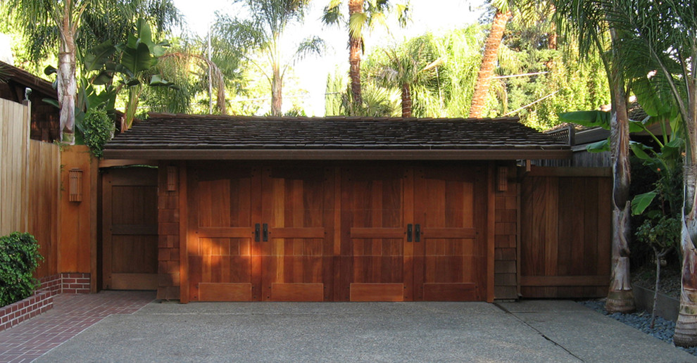 Inspiration for a medium sized contemporary attached garage in Los Angeles with three or more cars.