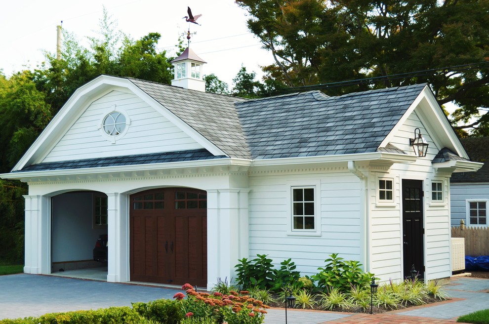 Garage - traditional detached two-car garage idea in New York