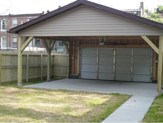 Источник вдохновения для домашнего уюта: отдельно стоящий гараж среднего размера в классическом стиле с навесом для автомобилей для двух машин