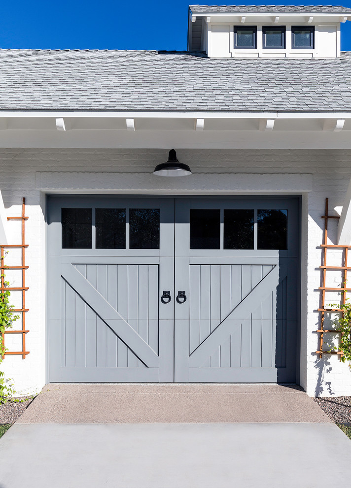 Example of a cottage garage design in Other