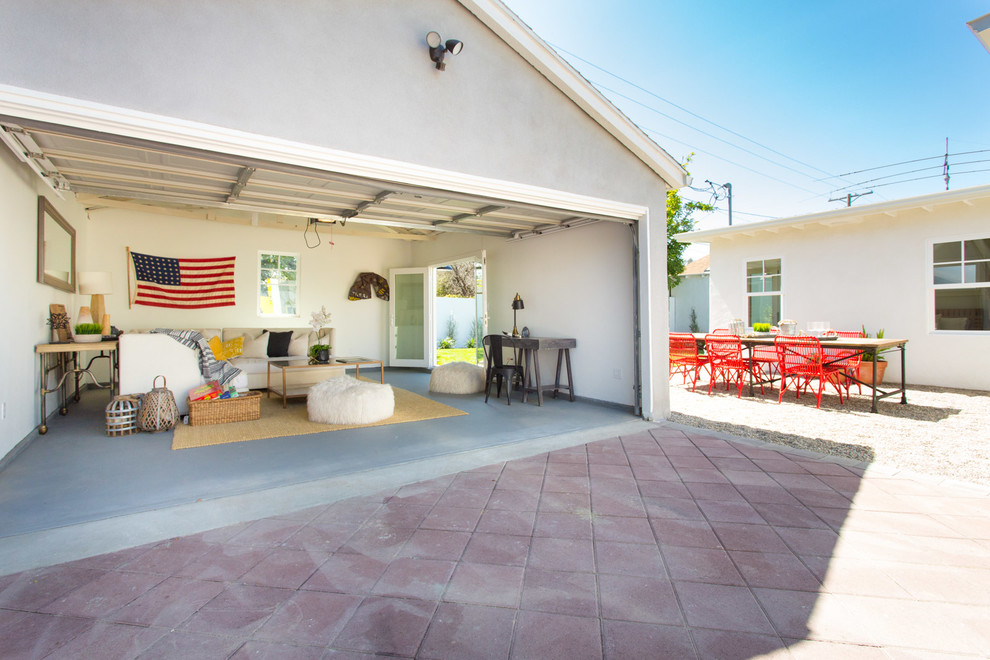 Design ideas for a medium sized farmhouse detached garage workshop in Los Angeles.