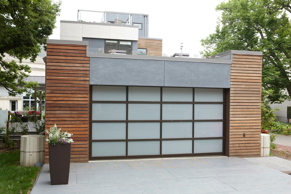 Inspiration for a mid-sized contemporary detached two-car garage workshop remodel in Chicago
