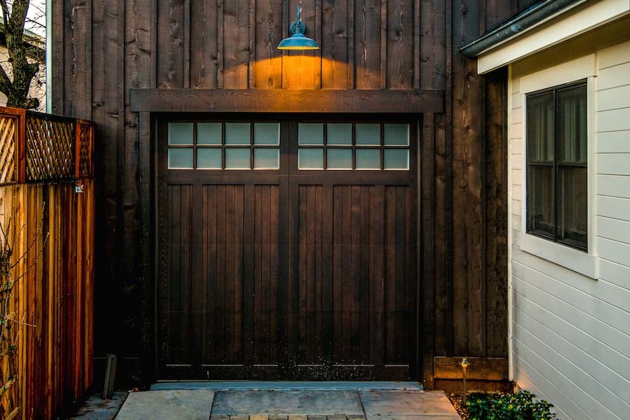 This is an example of a medium sized farmhouse attached single garage in San Francisco.