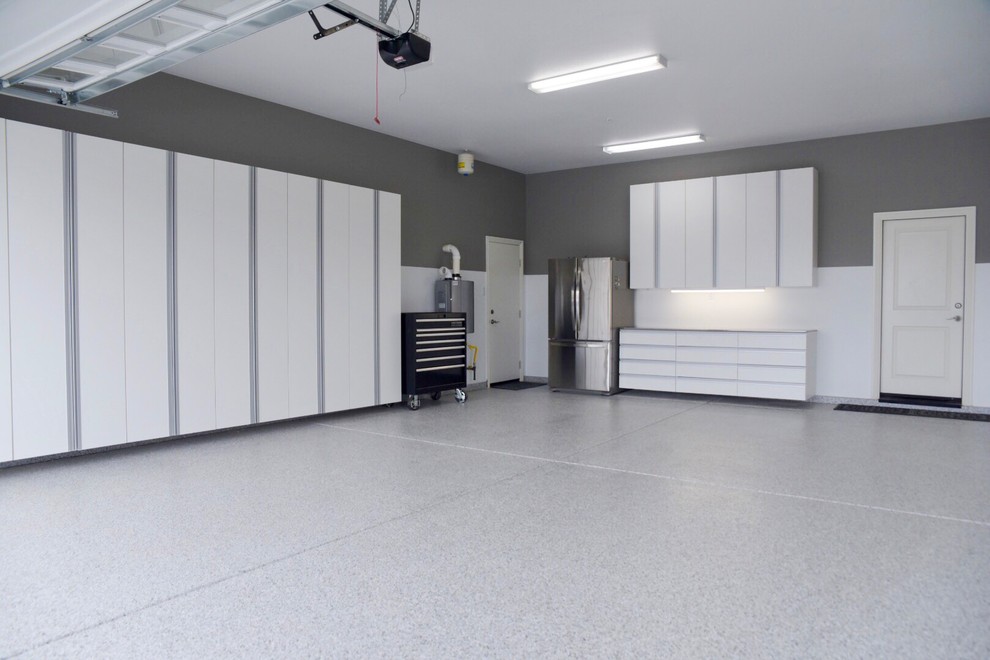 Design ideas for a large modern double garage in Other.