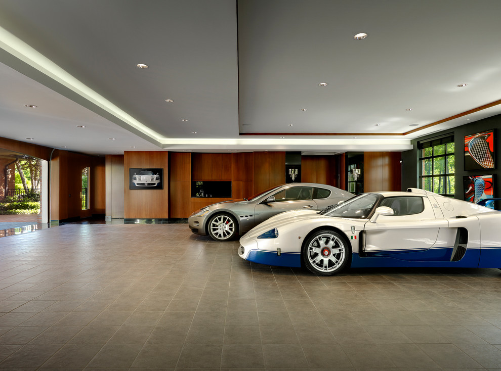 Идея дизайна: пристроенный гараж в современном стиле для двух машин