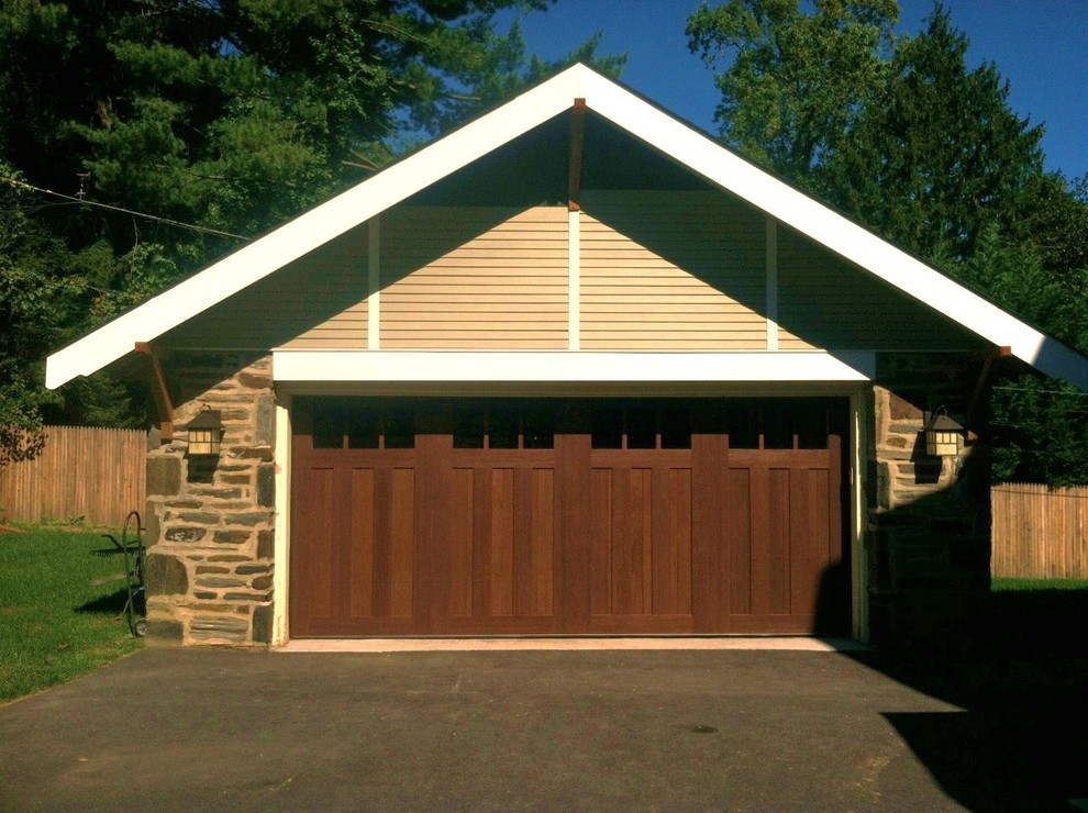 Design ideas for a medium sized traditional detached double garage in Philadelphia.