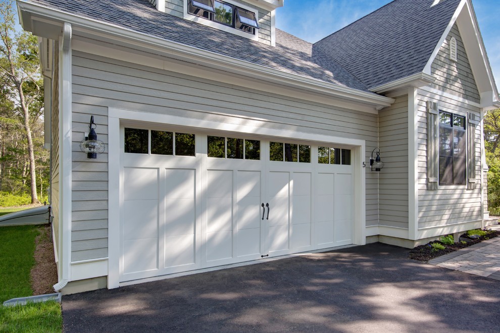 Design ideas for a medium sized classic attached double garage in Detroit.