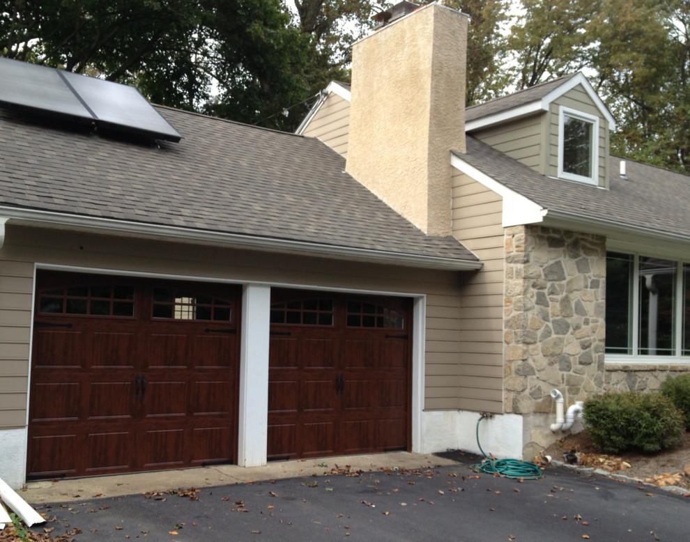 This is an example of a medium sized classic double garage in Philadelphia.