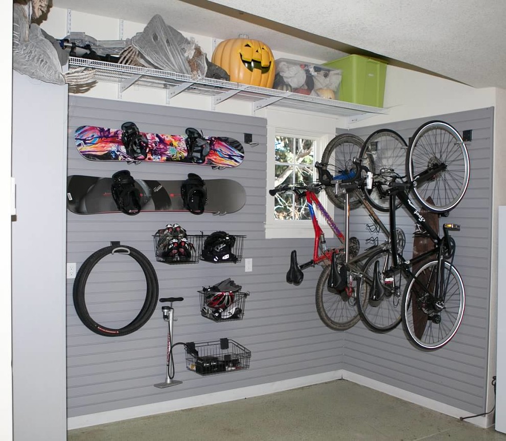 Example of a mid-sized arts and crafts attached garage design in Denver