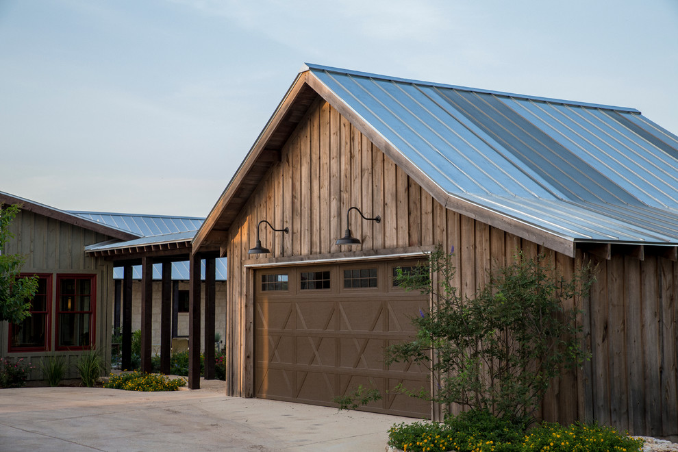 Design ideas for a medium sized rural detached double garage in Austin.