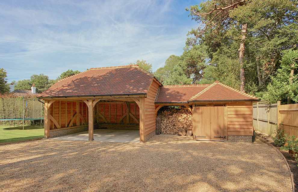 Combined oak framed garage with storage room Traditional Garage