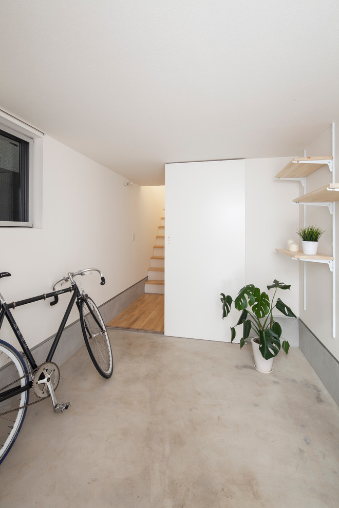 Design ideas for a contemporary attached garage in Tokyo.