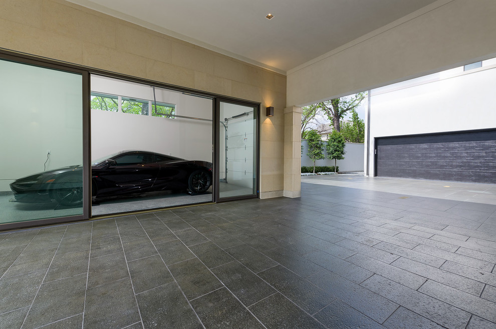На фото: пристроенный гараж среднего размера в современном стиле с навесом для автомобилей для двух машин