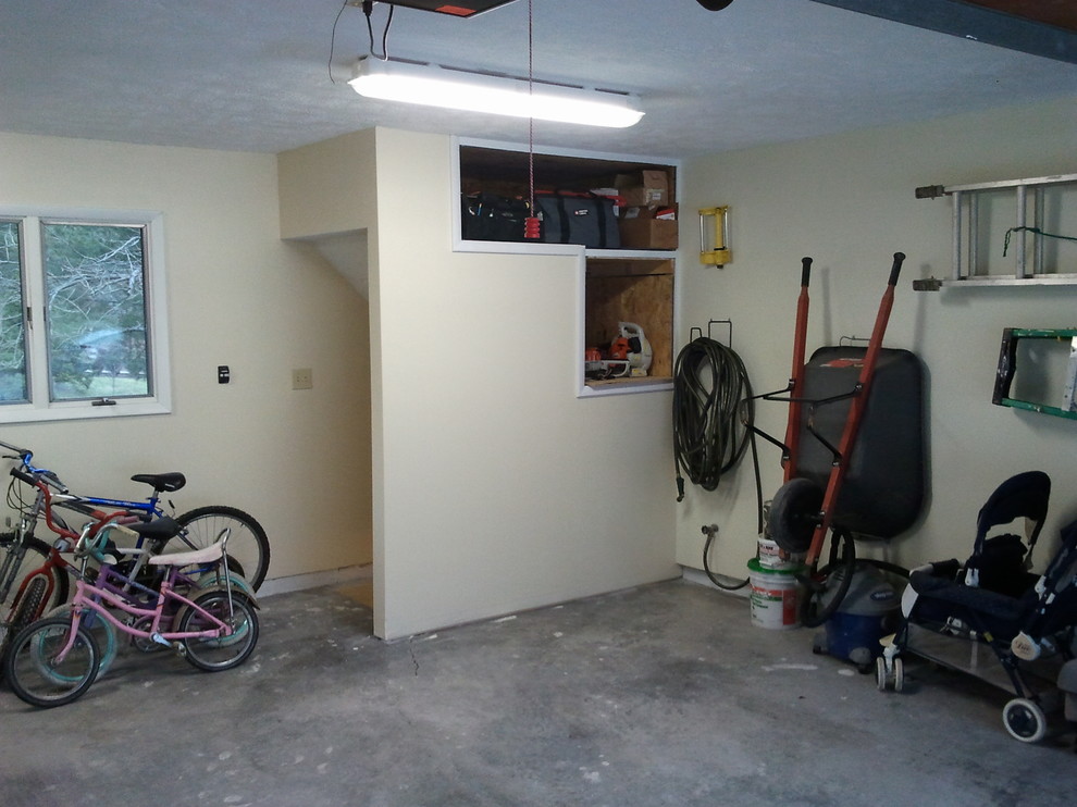 Exempel på en modern tvåbils garage och förråd
