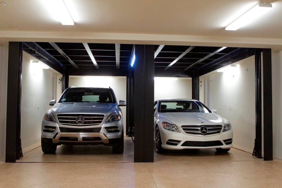 Custom car lift in California garage Contemporary Garage Los