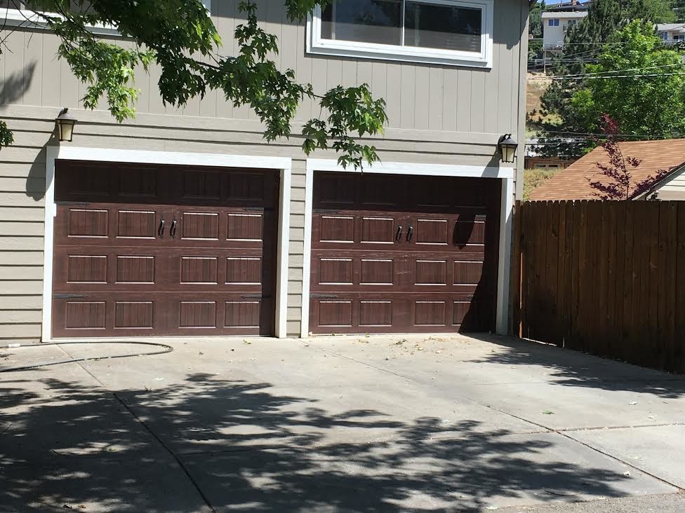 Photo of a medium sized traditional attached double garage in Boise.