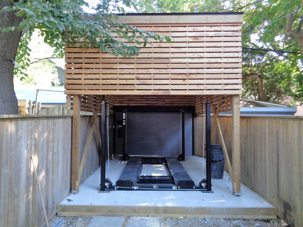Источник вдохновения для домашнего уюта: маленький отдельно стоящий гараж в стиле модернизм с навесом над входом для на участке и в саду, одной машины