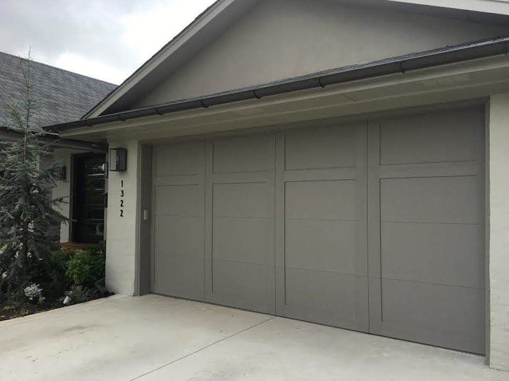 Medium sized traditional attached double garage in Oklahoma City.